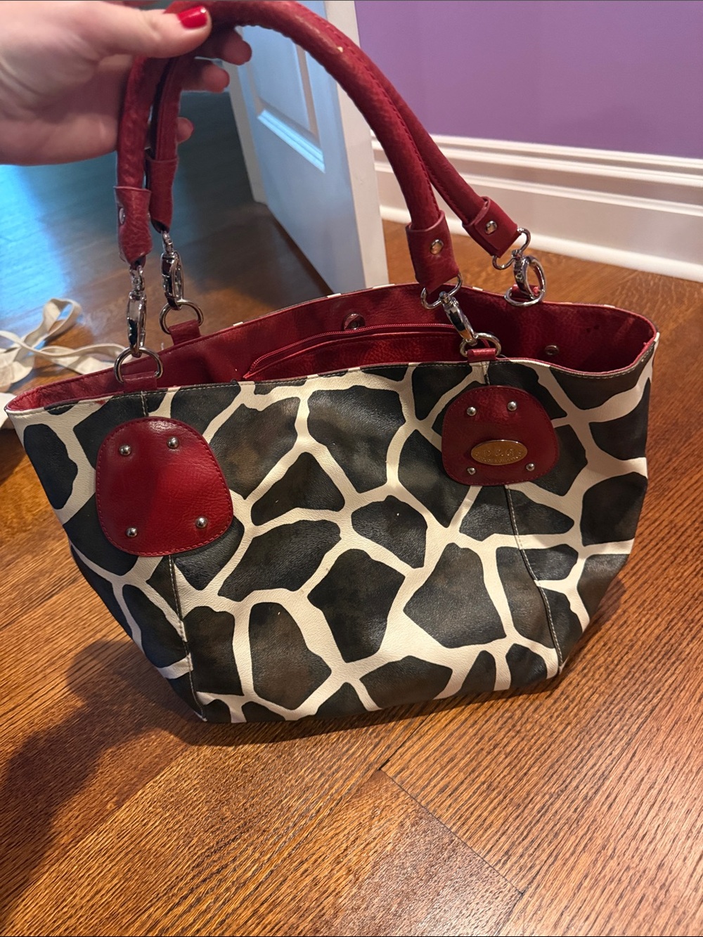 Dolce and Gabanna cow print bag with matching wallet